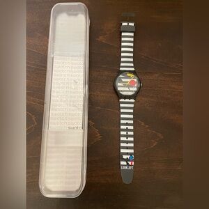 Swatch Black and White Striped Watch with Red and Blue Accents